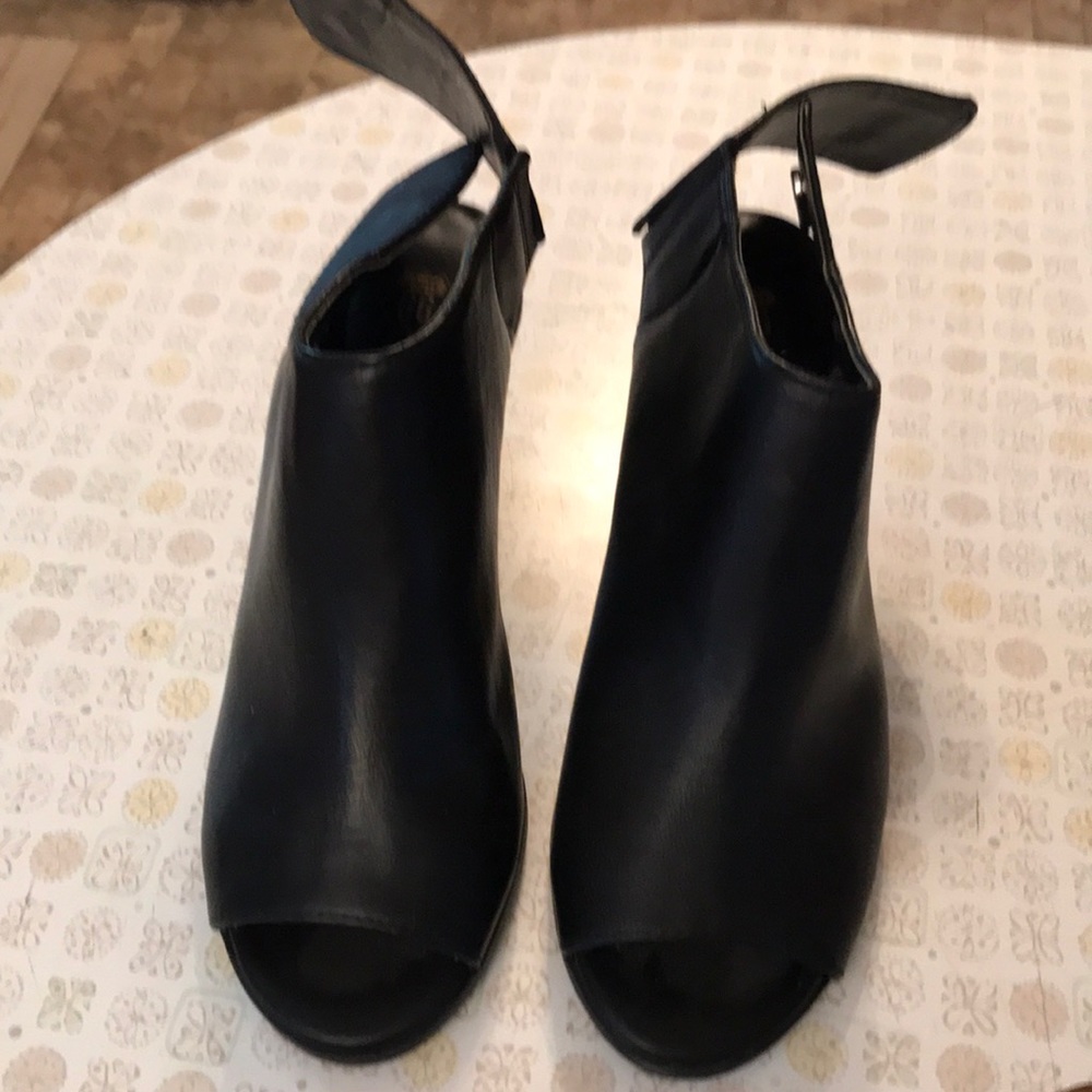 Used, great condition, black chunk heels, snap In back, size 7.5